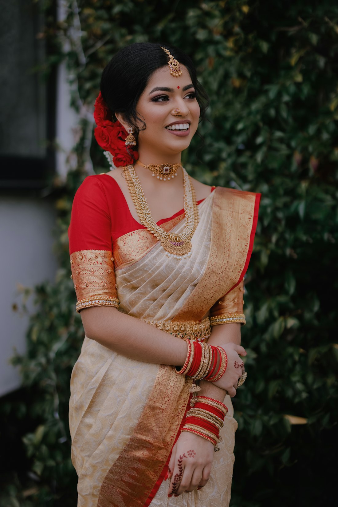 White saree with red border in soft morning light