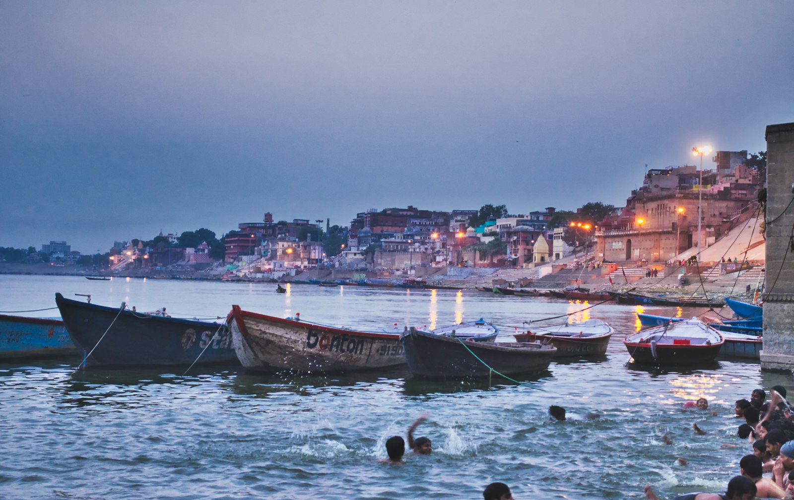 Boats at rest on the Ganga at dusk